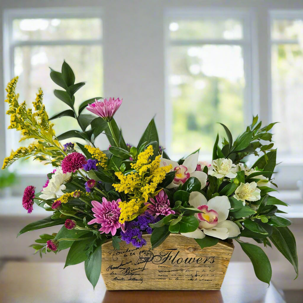 Bright and colorful flowers Winnipeg. Created by florist in Winnipeg. Valley Flowers, working hard to be our best florist in Winnipeg. 
